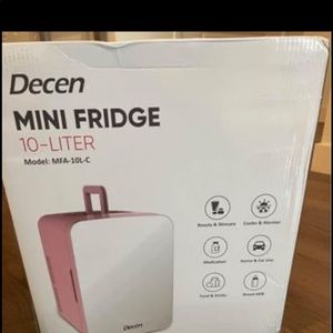 Pink mini fridge, great for cosmetics!
